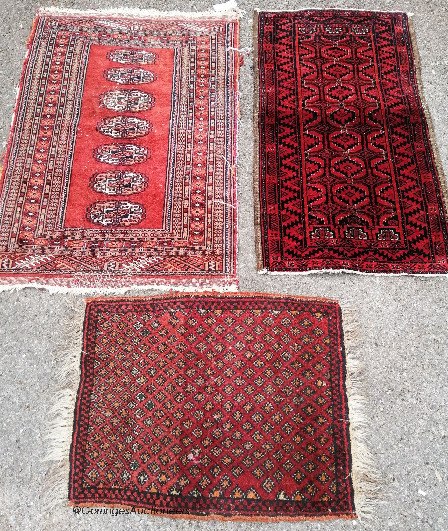 Three Bokhara rugs, largest 90 x 60cm